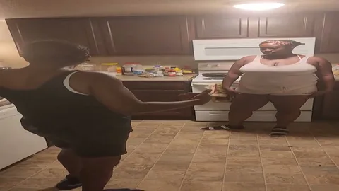 Chick gets a hard spanking in the kitchen standing up still 2