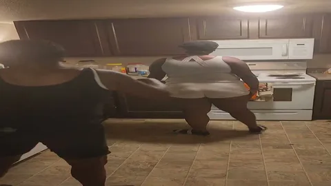 Chick gets a hard spanking in the kitchen standing up still 4