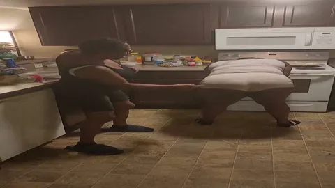 Chick gets a hard spanking in the kitchen standing up still 5