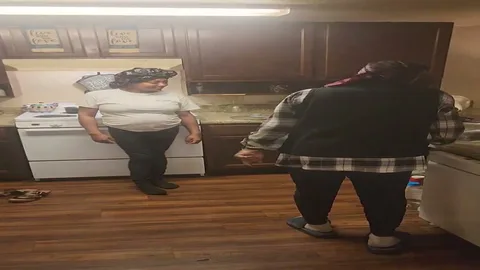 Chick gets paddled on the kitchen floor still 1