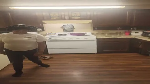 Chick gets paddled on the kitchen floor still 2