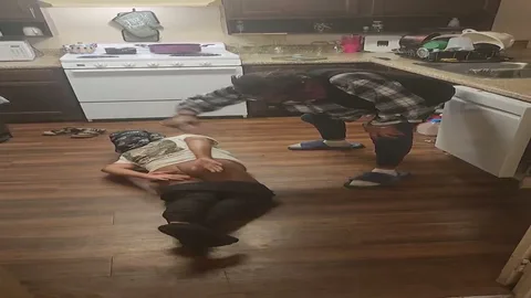 Chick gets paddled on the kitchen floor still 5