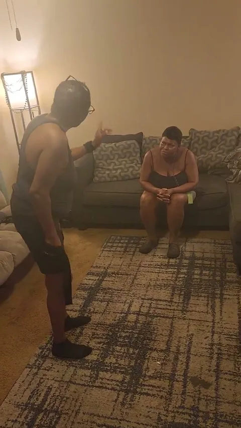 Granny gets a hit with belt in the living room still 2