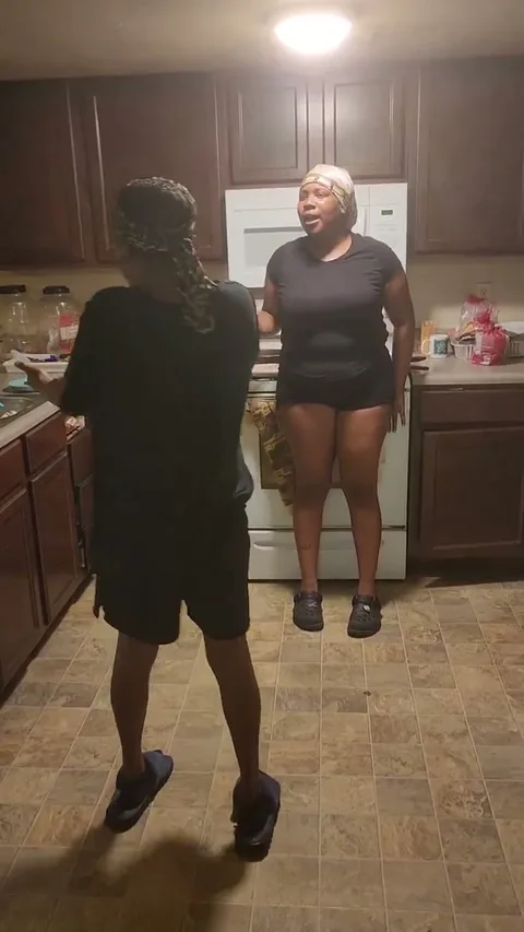 Granny spanks chick with switch in kitchen still 1