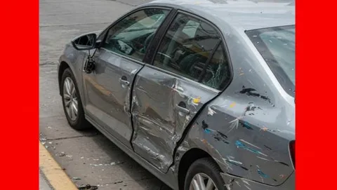 ITHAN SCRATCHES THE CAR still 1