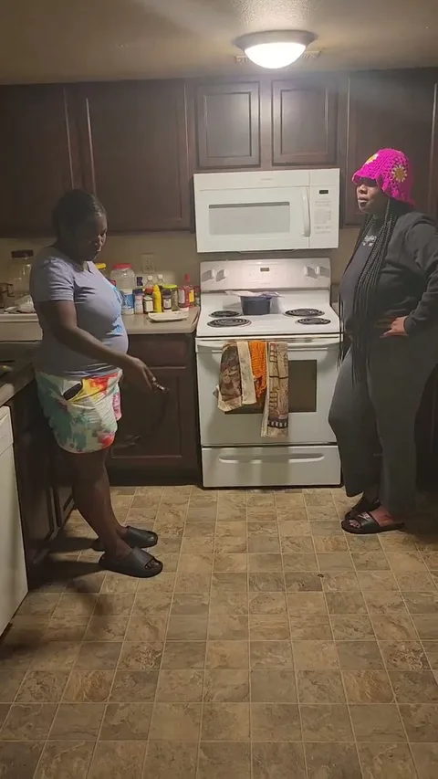 Kila gets spanked on dining room floor still 1