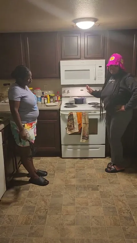 Kila gets spanked on dining room floor still 2