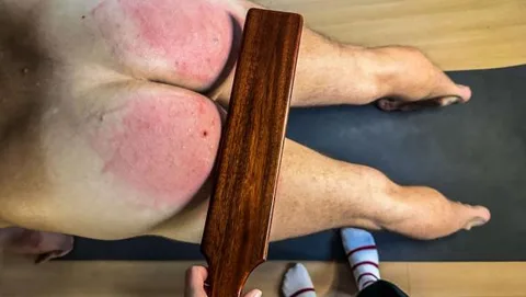 Madam D’s Yoga Motivation Hard Spanks on a Presented Bottom still 1