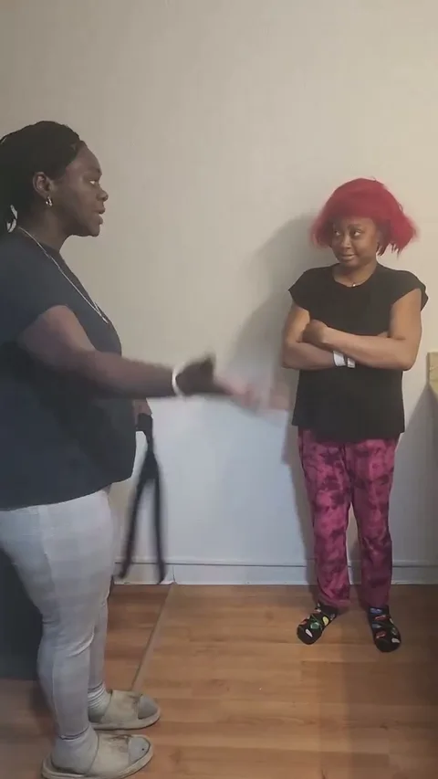 Red hair chick gets a hard spanking stsnding up still 1
