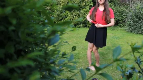 Slave Mila Plays with Her Bruised Caned Bottom Outdoors still 2