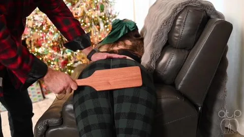 Spanked under the Tree - Strap, Cane and Paddle still 1