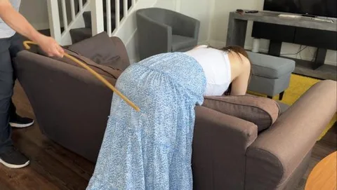 The Bohemian Tease - A maintenance spanking over a boho skirt, with the hand, hairbrush and cane still 5