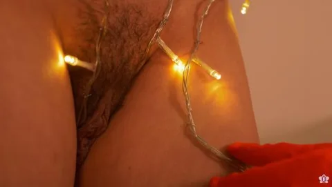 The Slave Christmas Ornament Mistress Roxy Turns Slave Mila Into a Christmas Tree, with Needle Play, Stapling and Objectification still 1